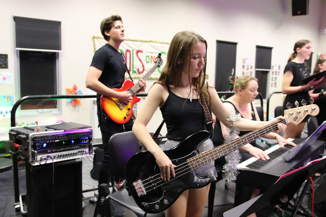 Danielle Thomas on Bass Guitar and Ethan Herpich on Electric Guitar, Beth Creedy on Piano Samantha Braithwaite singinig.JPG
