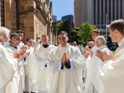 Fr Olek and Fr Anthony with priests.jpg
