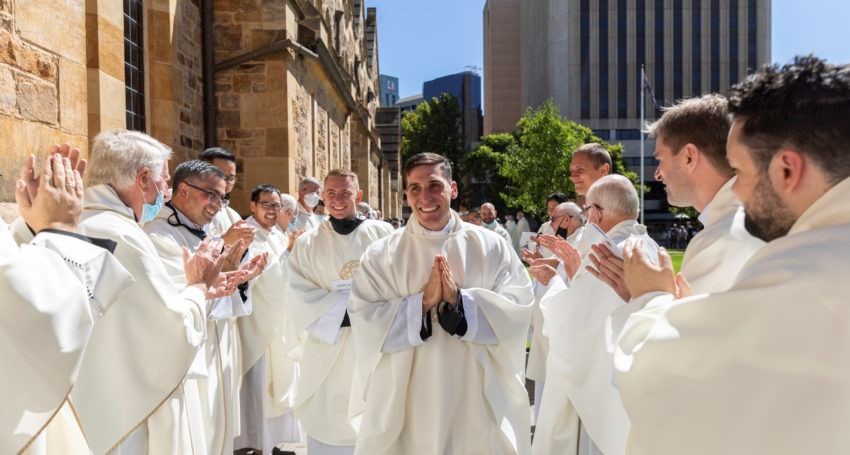 Fr Olek and Fr Anthony with priests.jpg
